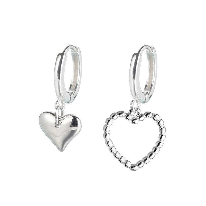 Asymmetric heart earrings