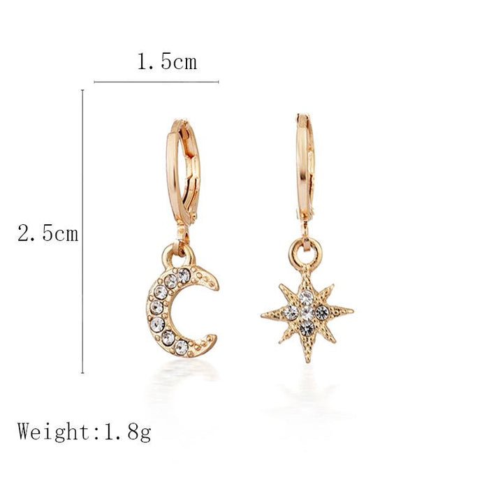 Diamond star and moon asymmetric earrings