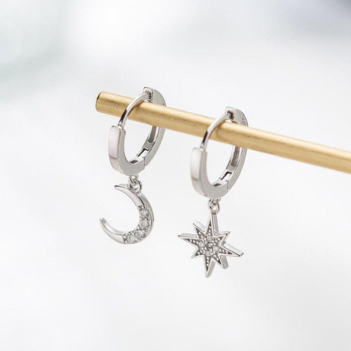 Diamond star and moon asymmetric earrings